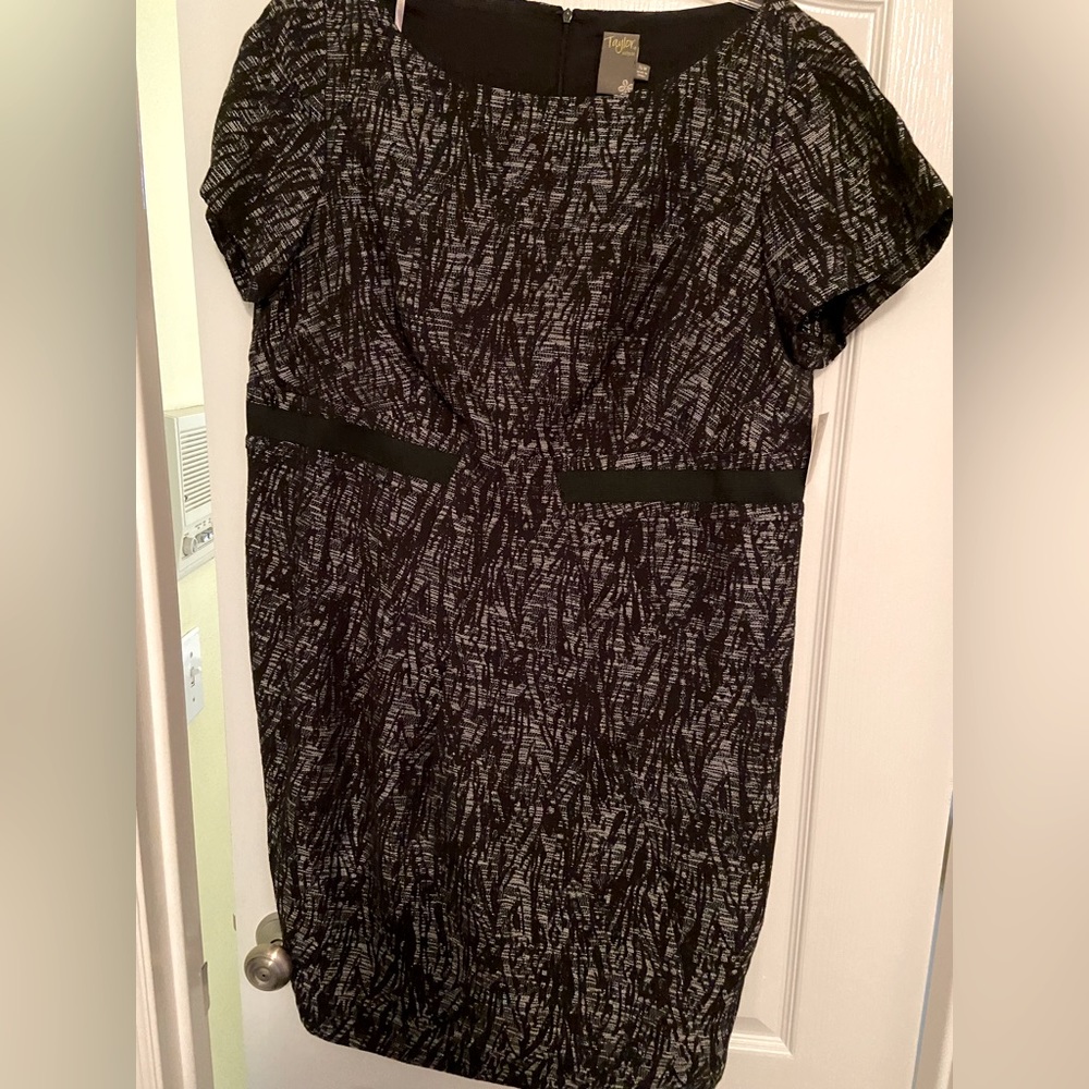 Black and grey sheath dress. Short sleeve, faux black belt